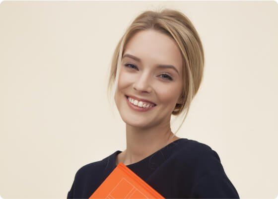 Young woman smiling and holding an orange notebook, a perfect image for AI brand marketing.
